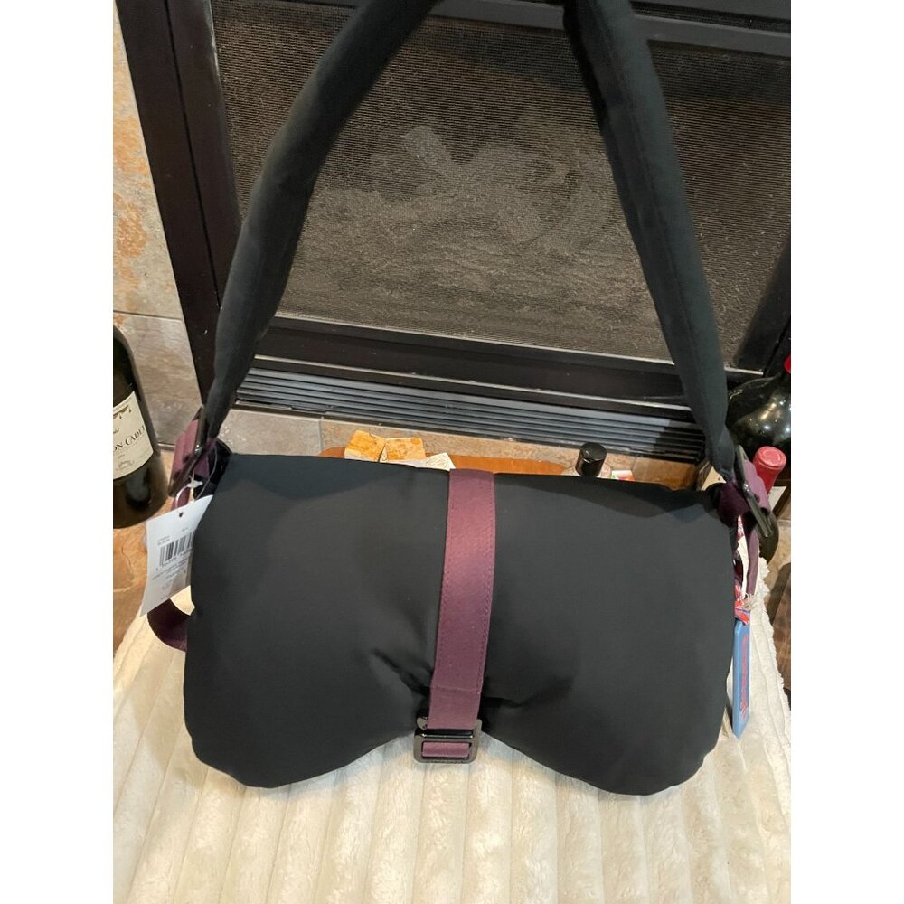 B317 - NWT Coach Coachtopia Loop Puffy Wavy Dinky bag in black and purple trim.